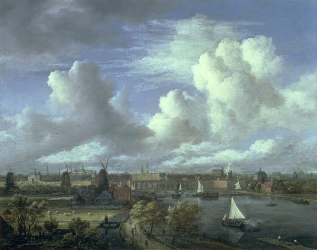 zicht op Amsterdam vanuit het zuiden met de silhouetten van de zuiderkerk, oude kerk en het stadhuis. links de utrechtse poort Schilderij van Jacob van Ruisdael, ca. 1675.