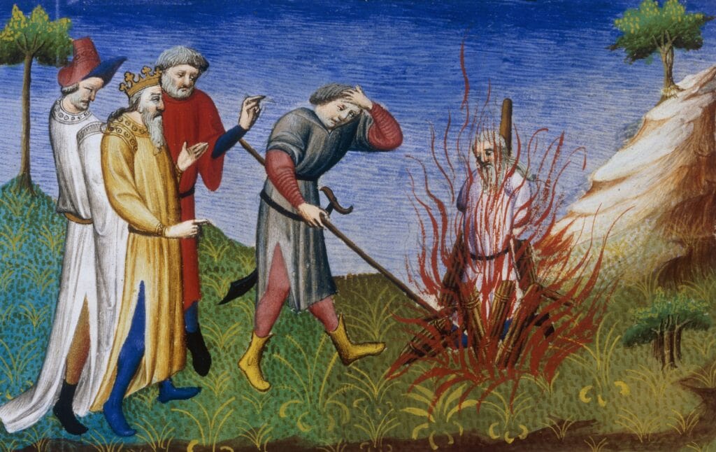 Koning van Ghinghintalas ziet hoe een man overleeft op een brandstapel, dankzij een vuurwerende mantel van ‘salamander'