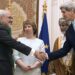 Iran en Amerika: John Kerry schudt de hand van Javad Zarif.
