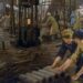 Vrouwen aan het werk in een munitiefabriek. Schilderij door Stanhope Forbes, 1918.