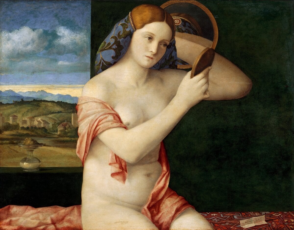 Een jonge vrouw maakt toilet. Schilderij door Giovanni Bellini